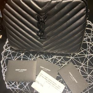 Saint Laurent black crossbody leather camera bag. Barely used, good condition!